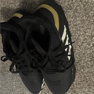 Adidas Black Sneakers with Gold Highlights